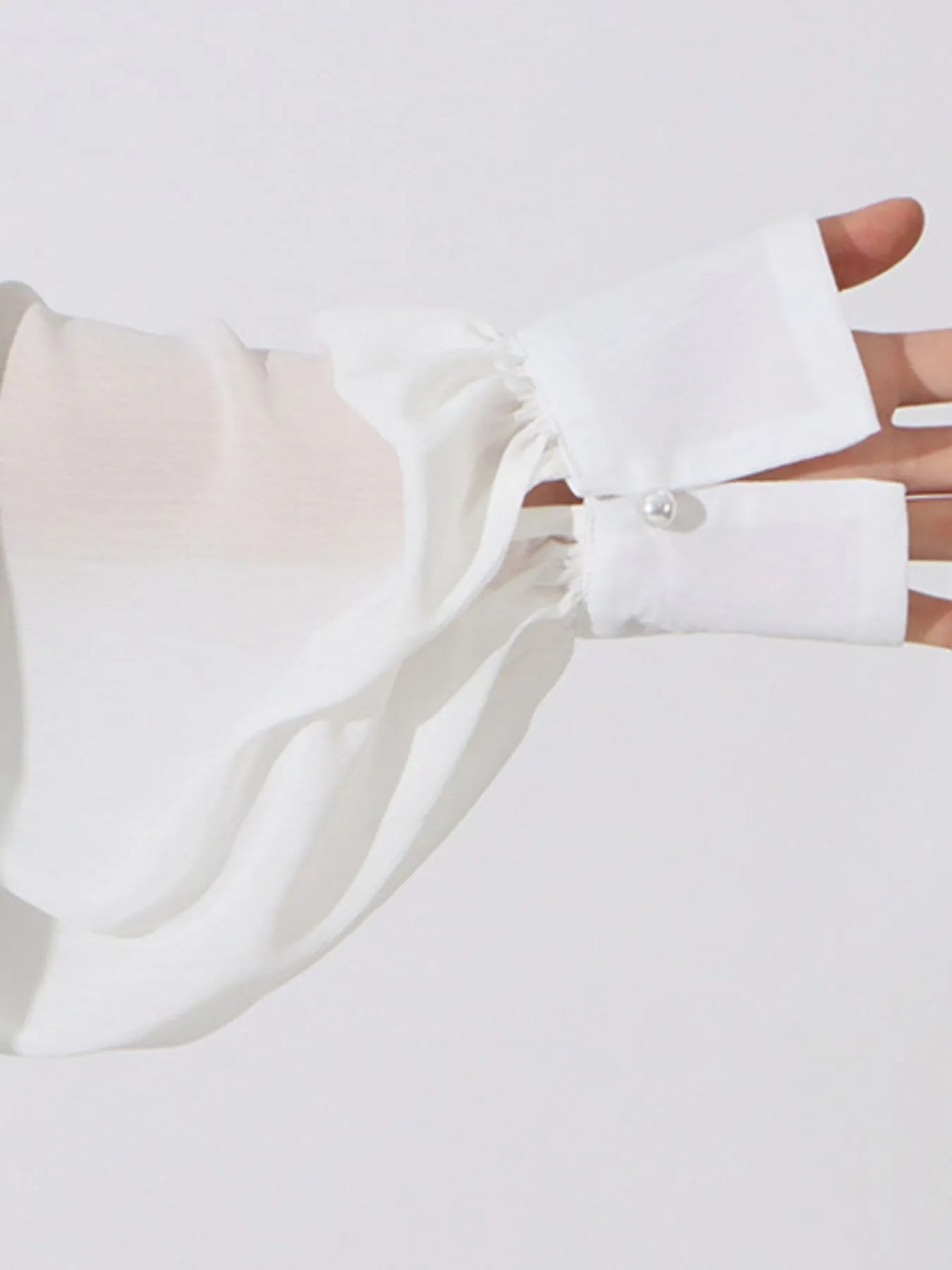 Trendsi Ruffled Hem Long Sleeve Blouse