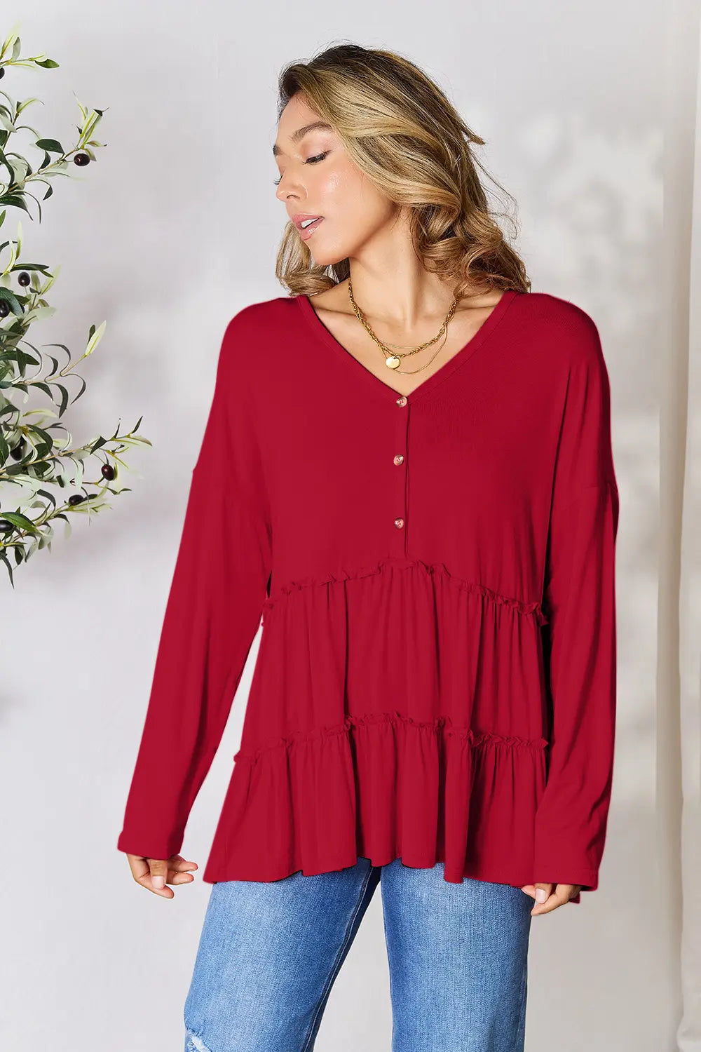 Trendsi Double Take Half Button Long Sleeve Ruffle Hem Blouse