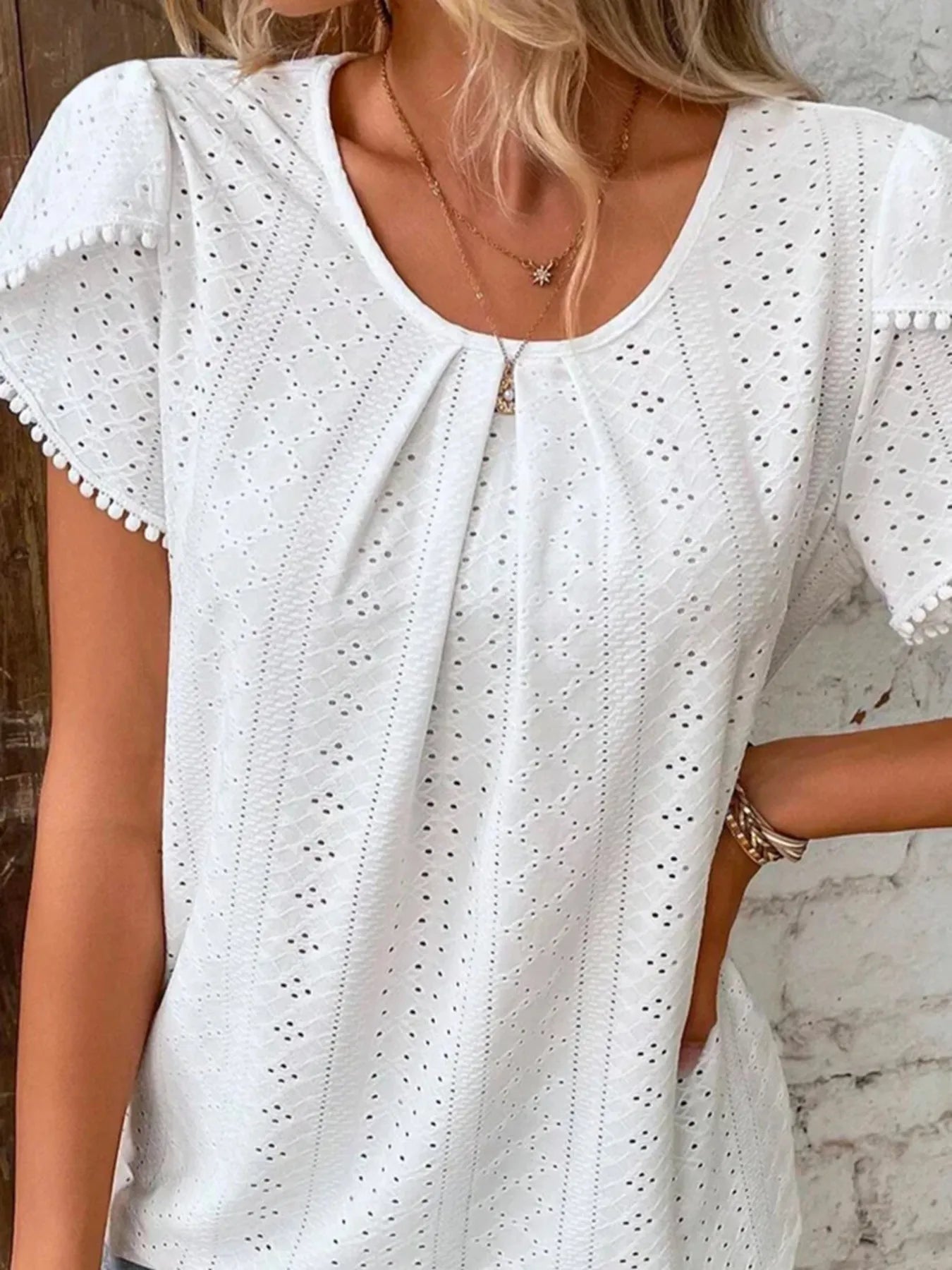 Trendsi Eyelet Petal Sleeve Top with Pom Pom Trim