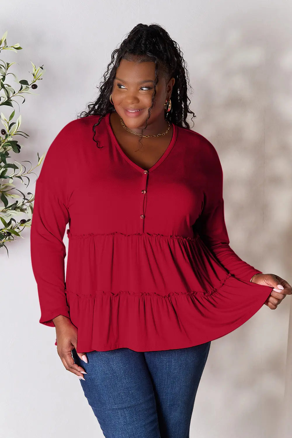 Trendsi Double Take Half Button Long Sleeve Ruffle Hem Blouse