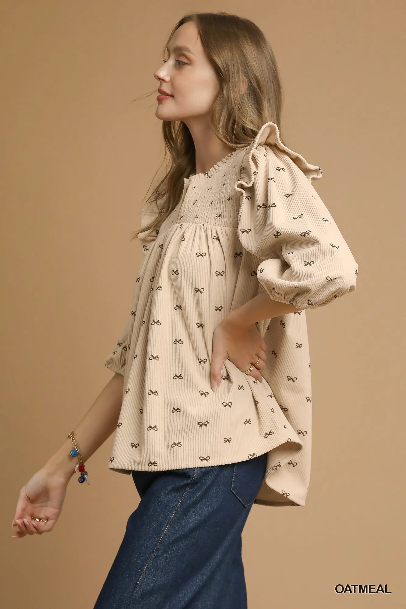 Trendsi Umgee Bow Print Corduroy Puff Sleeve Blouse with Ruffled