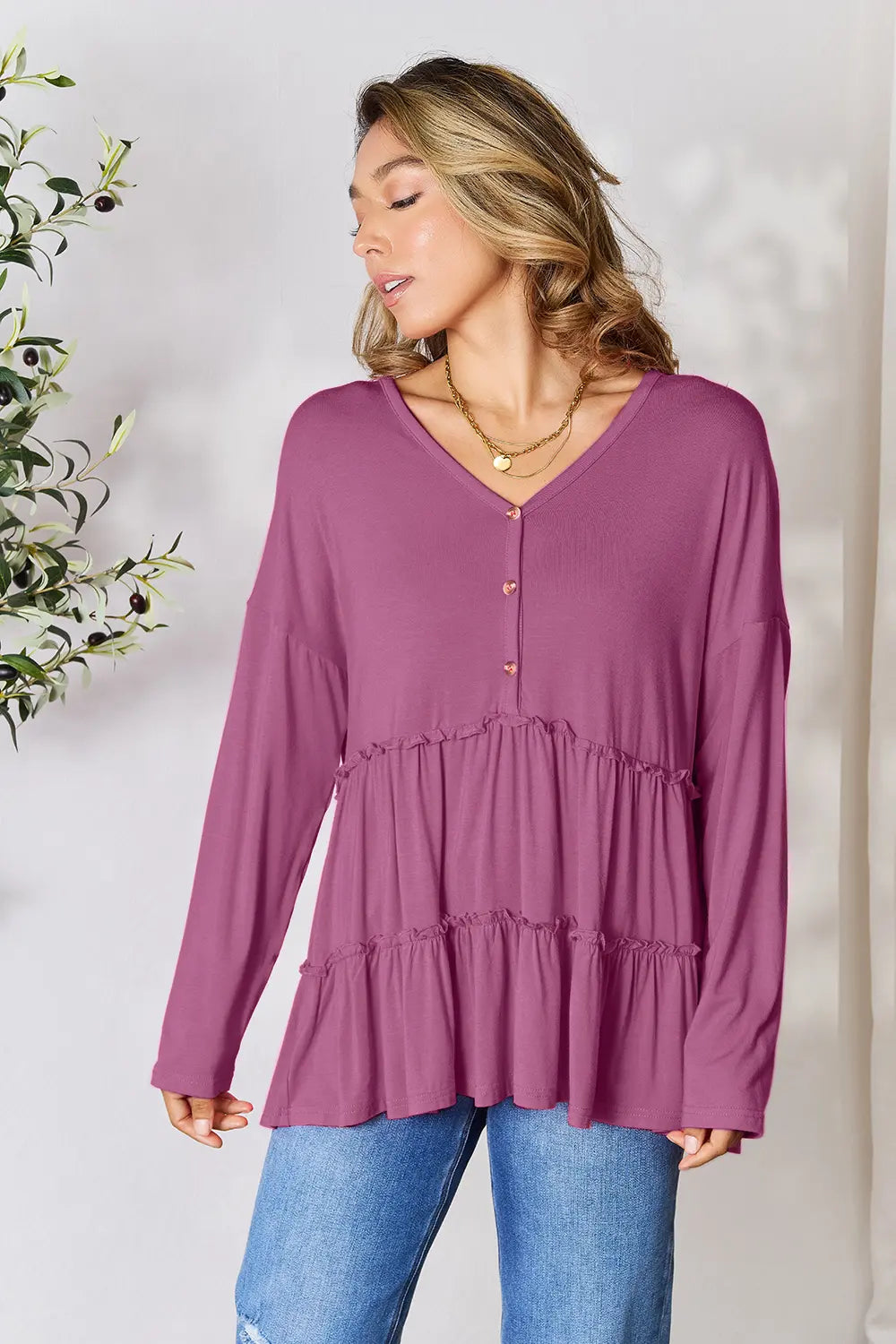 Trendsi Double Take Half Button Long Sleeve Ruffle Hem Blouse
