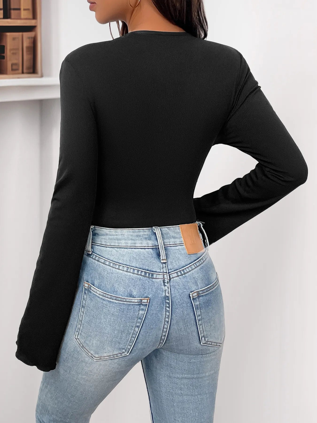 Trendsi Flower Round Neck Long Sleeve Bodysuit