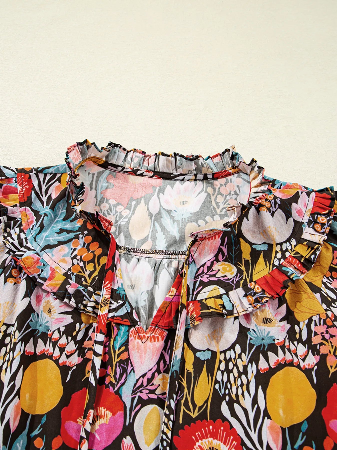 Trendsi Floral 3/4 Puff Sleeve Tied Neck Blouse