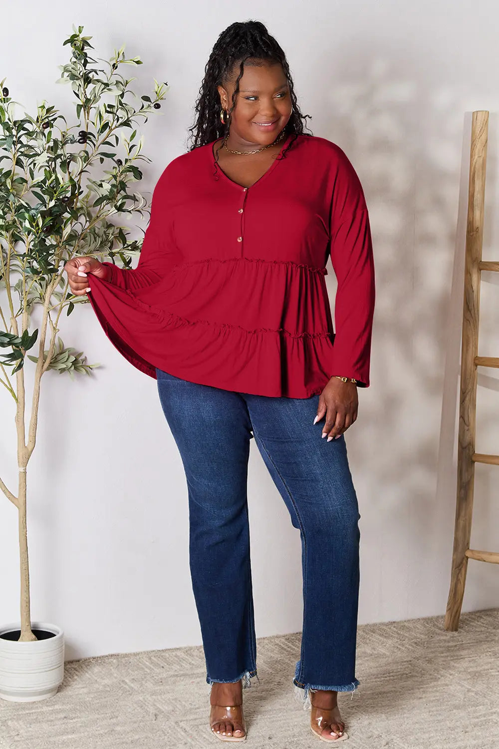 Trendsi Double Take Half Button Long Sleeve Ruffle Hem Blouse