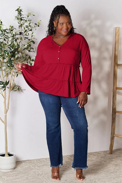 Trendsi Double Take Half Button Long Sleeve Ruffle Hem Blouse