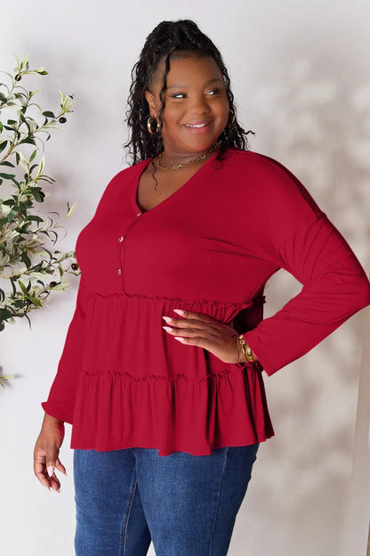Trendsi Double Take Half Button Long Sleeve Ruffle Hem Blouse