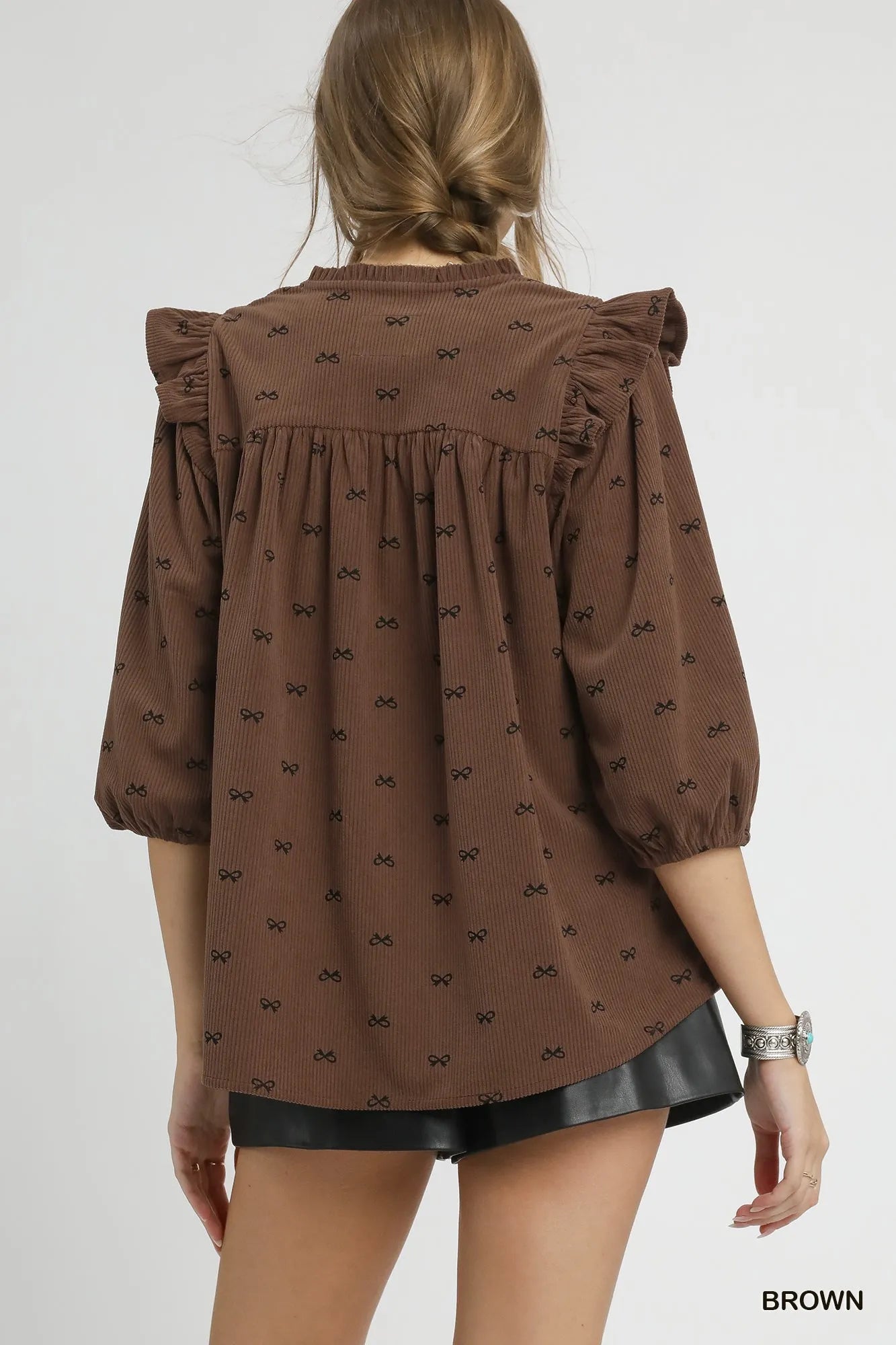 Trendsi Umgee Bow Print Corduroy Puff Sleeve Blouse with Ruffled