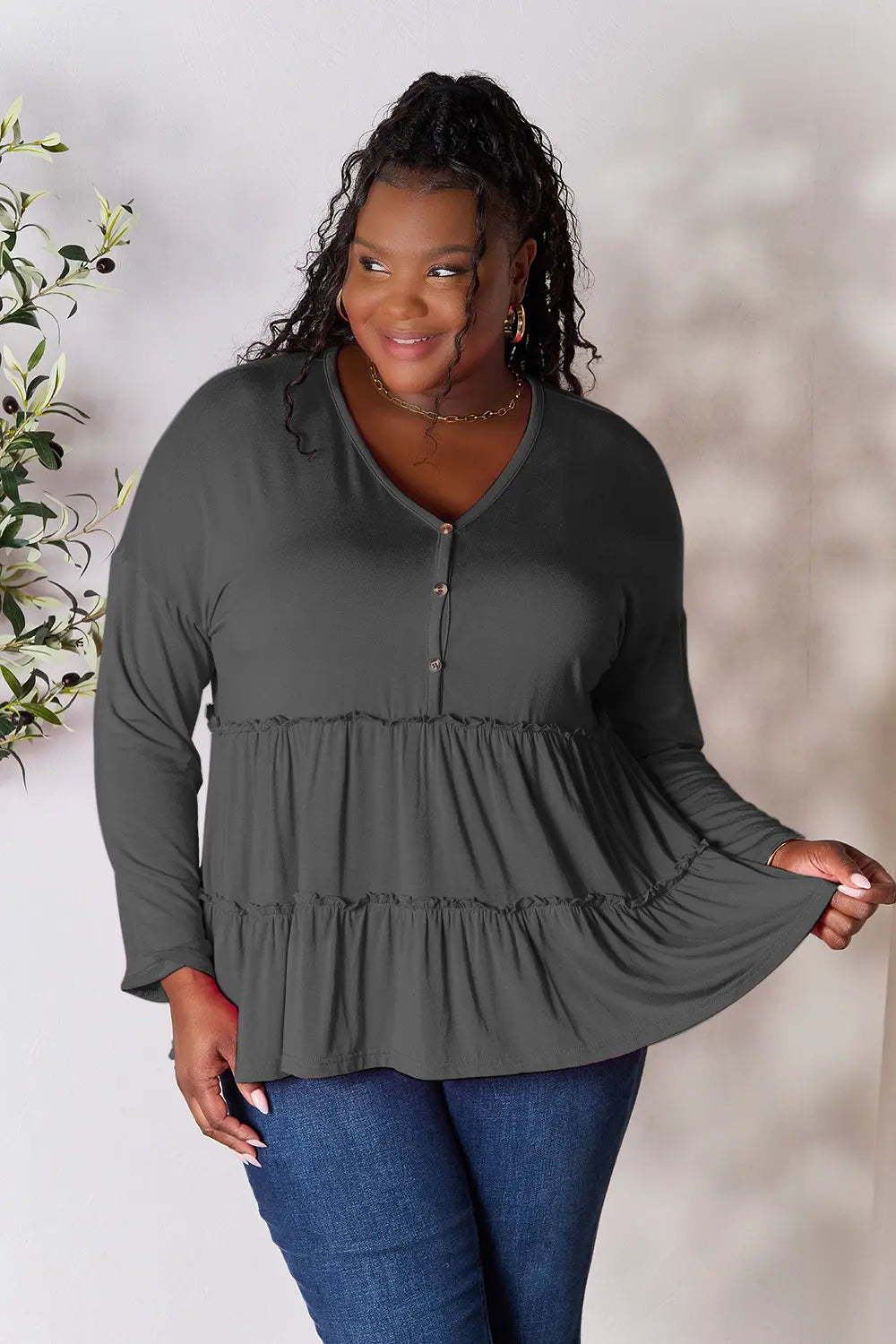 Trendsi Double Take Half Button Long Sleeve Ruffle Hem Blouse