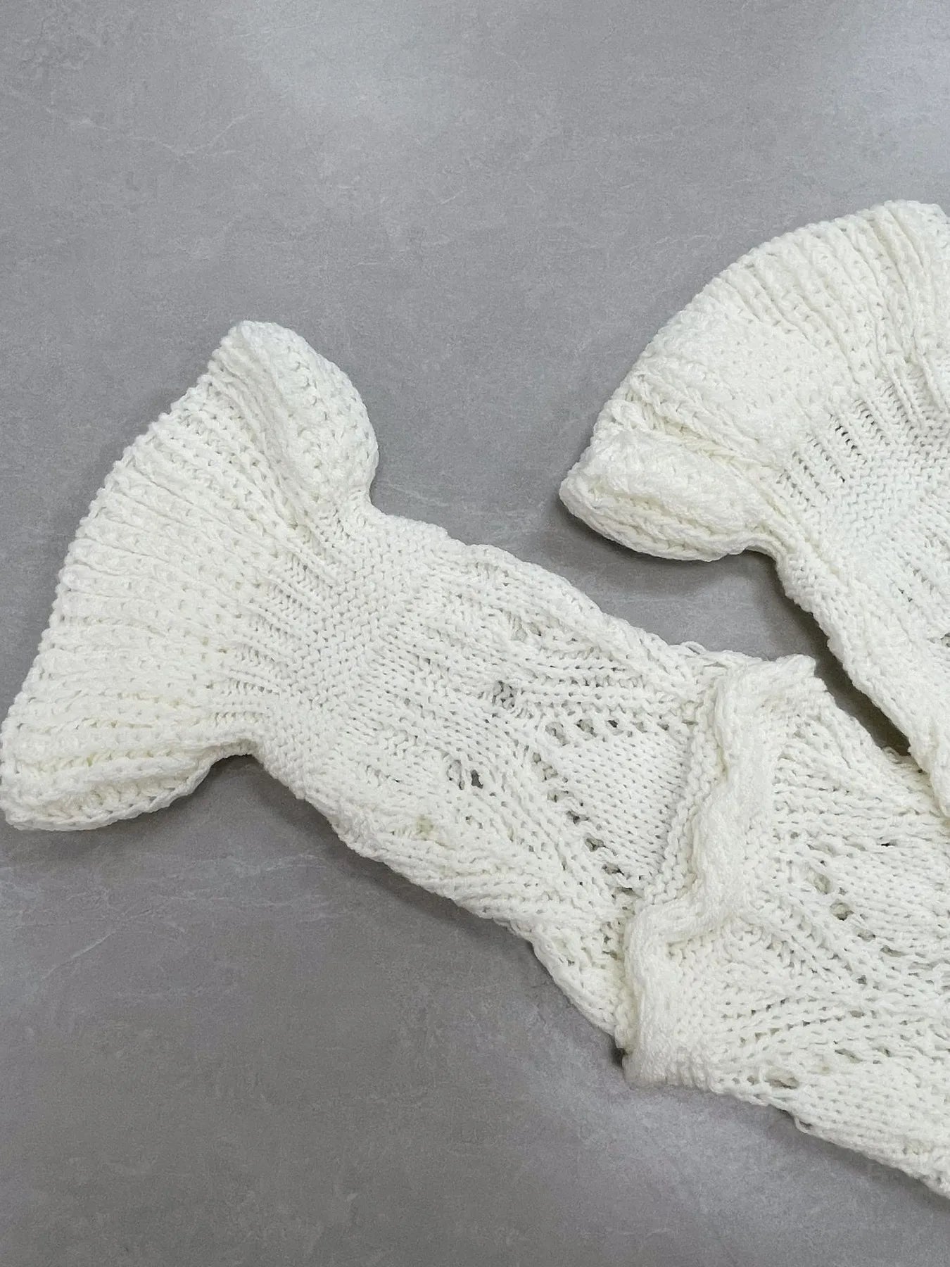 Trendsi Crochet Ruffled Hem Long Sleeve Sweater