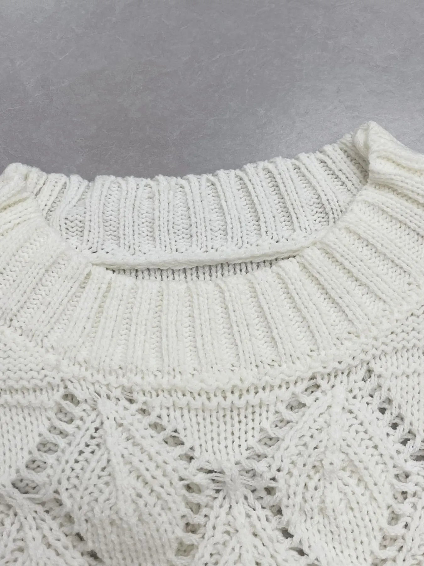 Trendsi Crochet Ruffled Hem Long Sleeve Sweater