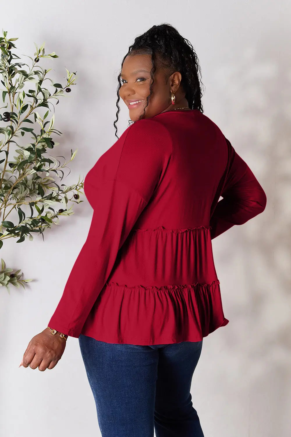 Trendsi Double Take Half Button Long Sleeve Ruffle Hem Blouse