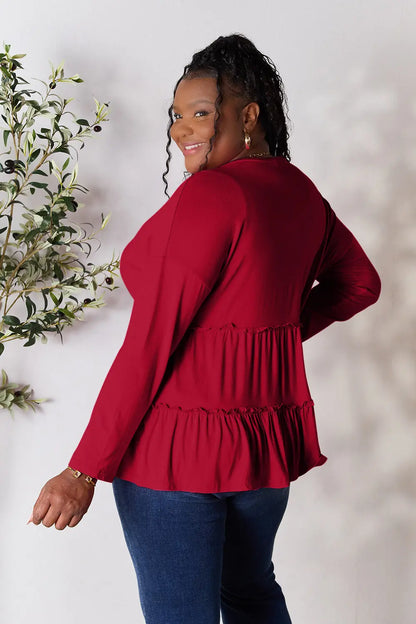 Trendsi Double Take Half Button Long Sleeve Ruffle Hem Blouse