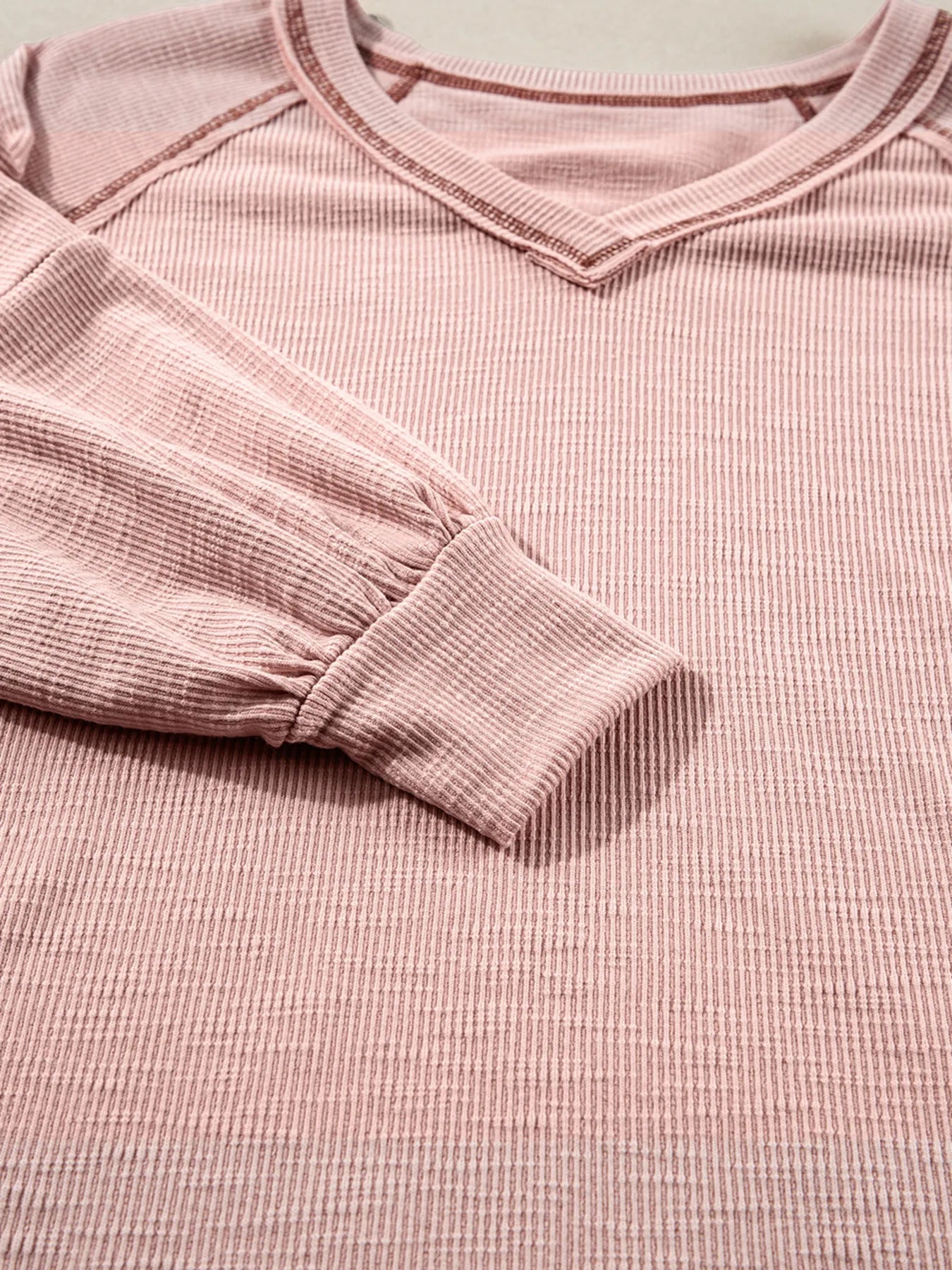 Trendsi Exposed Seam Ribbed Knit V Neck Top