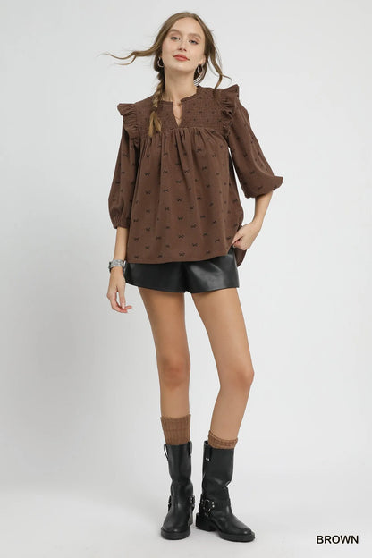 Trendsi Umgee Bow Print Corduroy Puff Sleeve Blouse with Ruffled