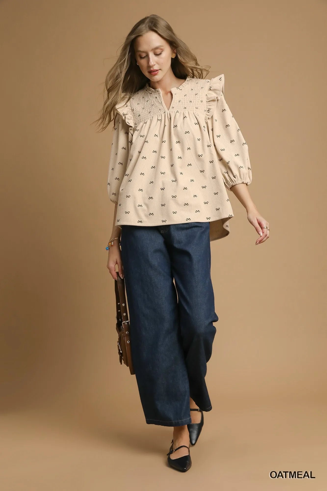 Trendsi Umgee Bow Print Corduroy Puff Sleeve Blouse with Ruffled