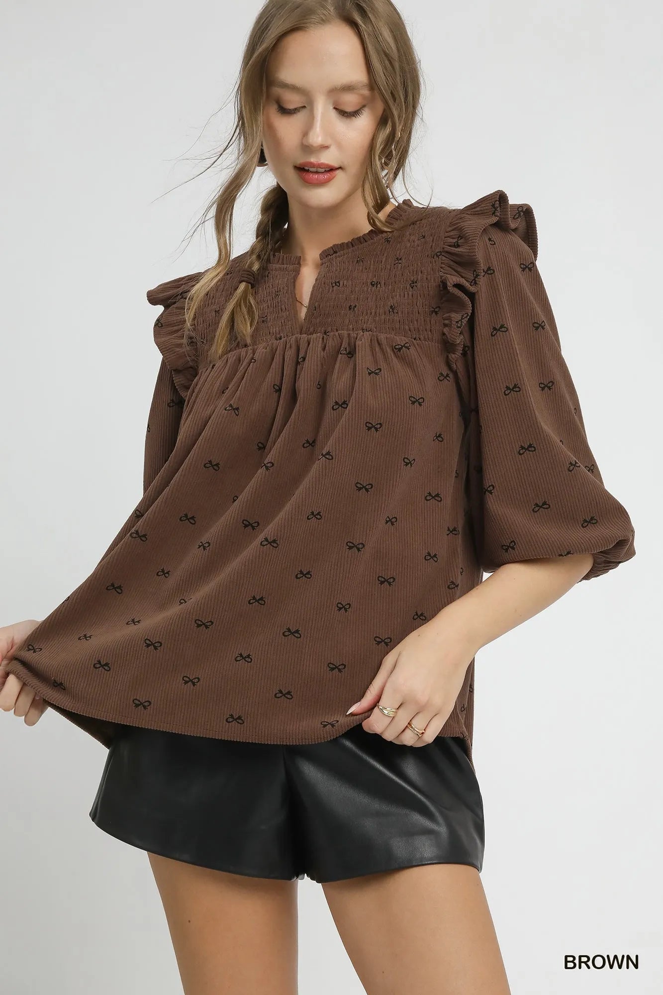 Trendsi Umgee Bow Print Corduroy Puff Sleeve Blouse with Ruffled