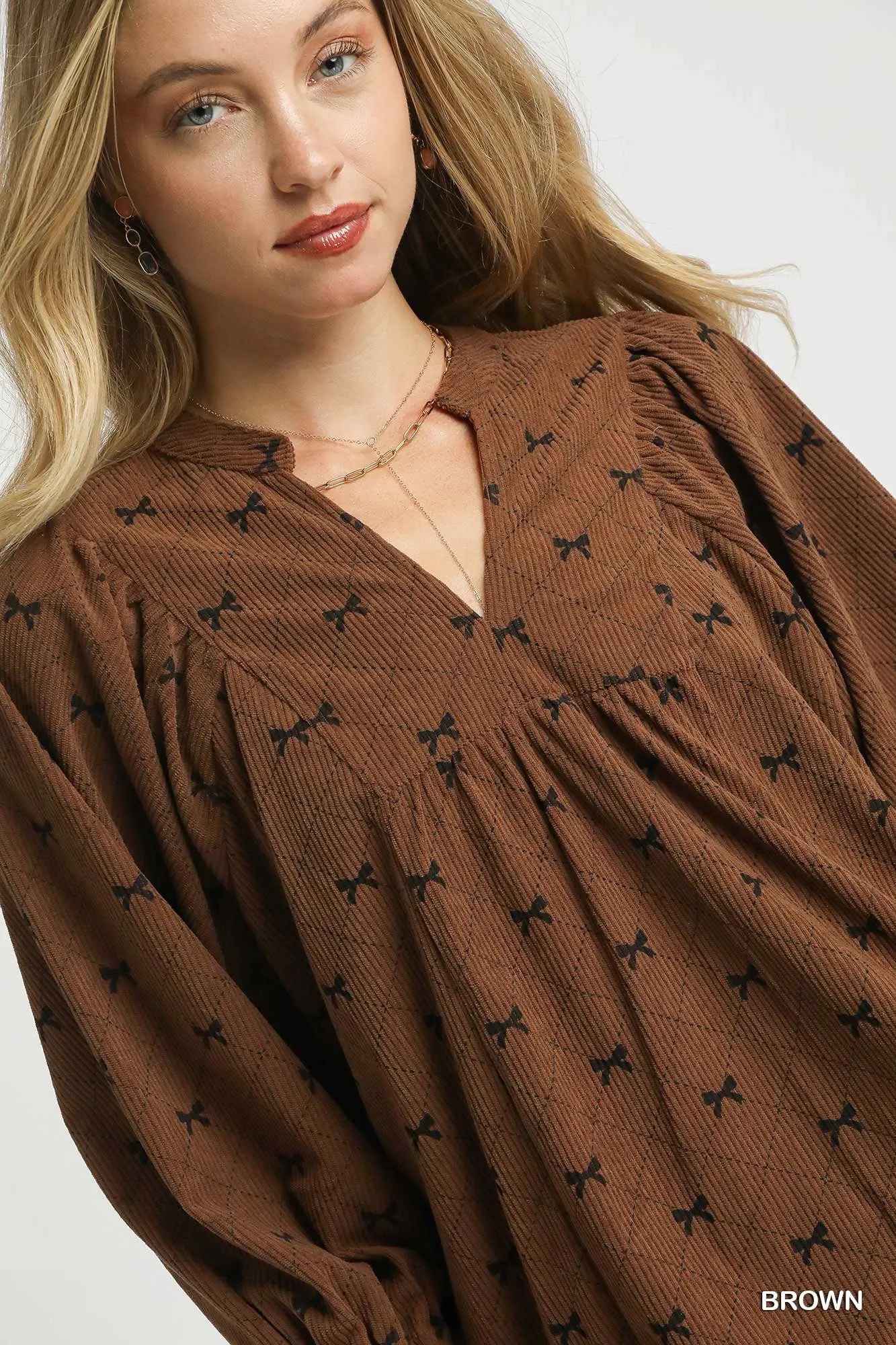 Trendsi Umgee Corduroy Bow Print Balloon Sleeve Blouse