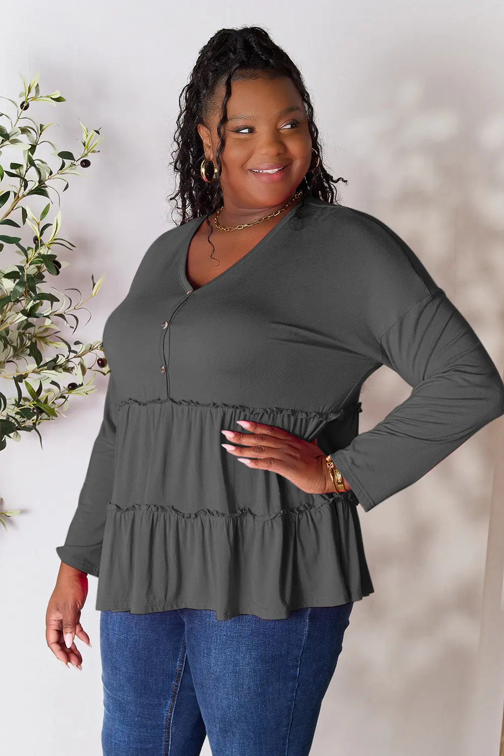 Trendsi Double Take Half Button Long Sleeve Ruffle Hem Blouse
