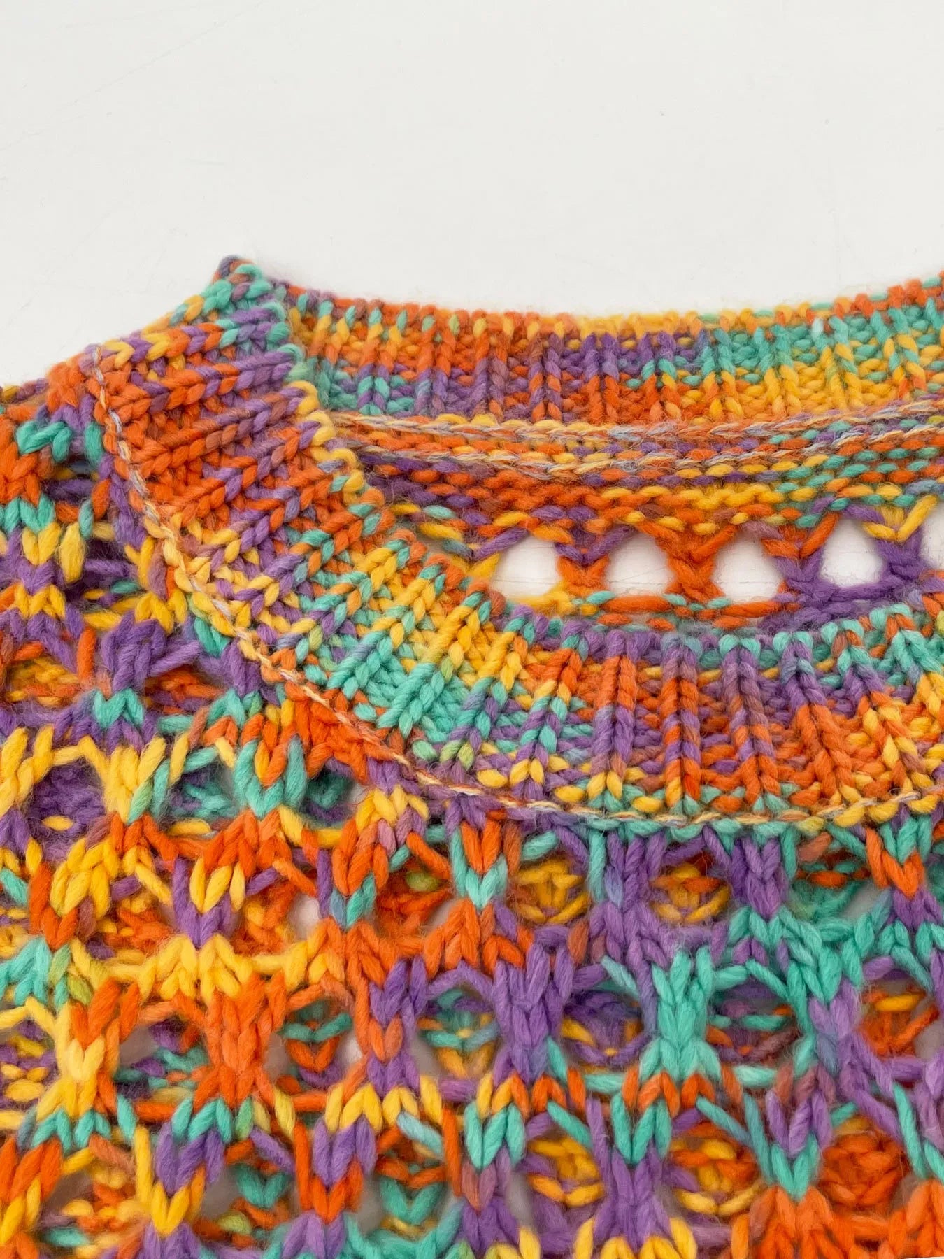 Trendsi Rainbow Crochet Hollow Out Cropped Sweater