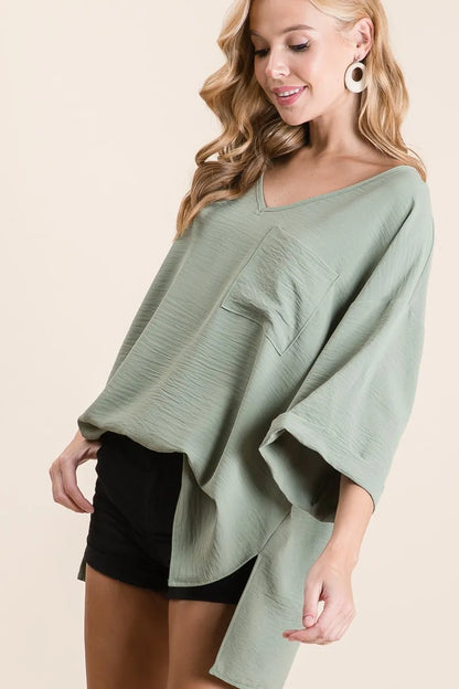 Trendsi BiBi Flowy Woven V-Neck Top with Rolled Up Cuffs
